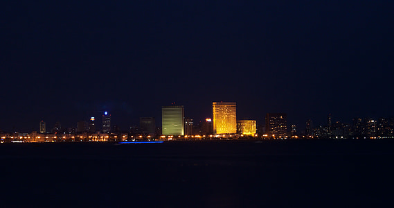 landscape photography of commercial buildings during nighttime thumbnail