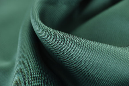 green textile close-up photography thumbnail