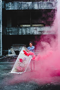 Person Holding Red Smoke Signal thumbnail