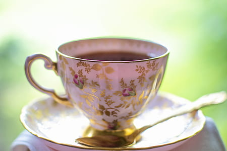 white-and-gold floral cup on saucer thumbnail