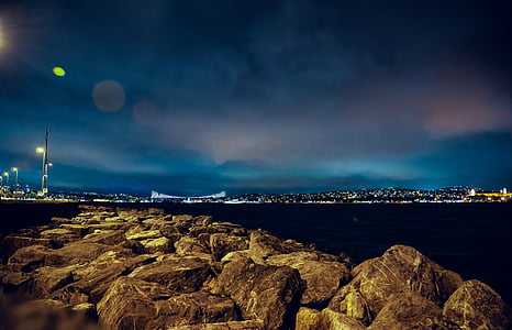 scenery of city building during night time thumbnail