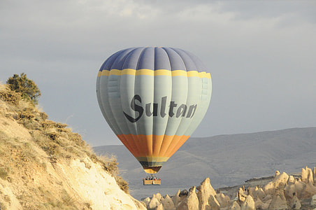 photo of gray, orange and blue Sultan hot air balloon during daytime thumbnail