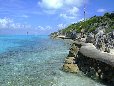 body of water near at mountain thumbnail