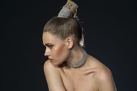 topless woman with grey collar necklace thumbnail