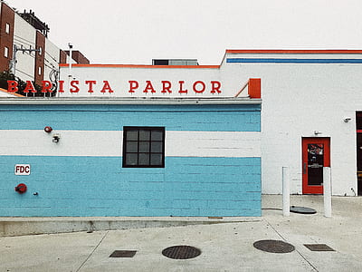 Barista Parlor signage above blue and white building thumbnail