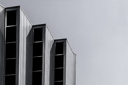 architectural photography of gray building thumbnail