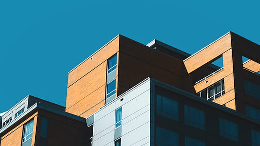 brown and white concrete building thumbnail