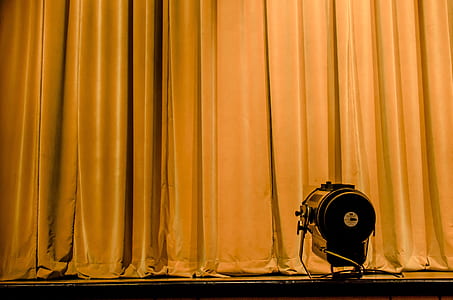 closed brown stage curtain thumbnail