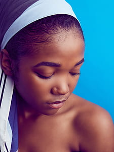 woman wearing white bandana thumbnail