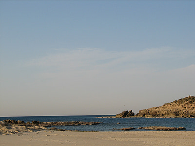 seashore under blue sky thumbnail