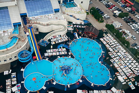 aerial view of group of peoples on swimming pool thumbnail