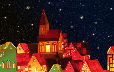 lighted red and green houses at nighttime illustration thumbnail
