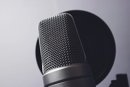 black condenser microphone beside pop filter thumbnail
