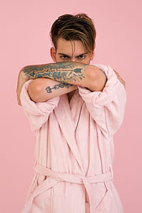 man wearing pink bath robe thumbnail