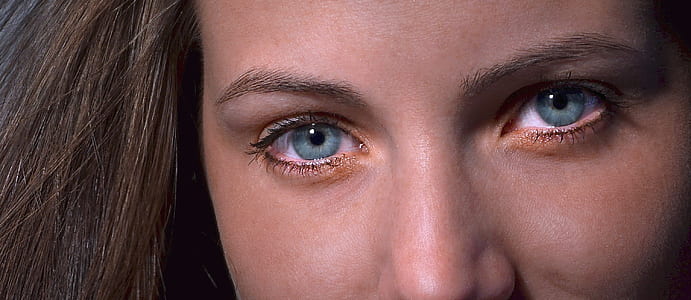 closed up photo of female with blue eyes thumbnail