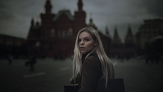 woman with cathedral behind thumbnail