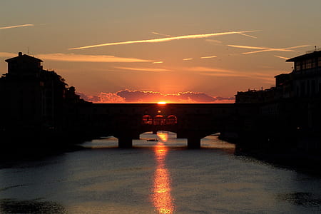 silhouette of bridge at sunset thumbnail
