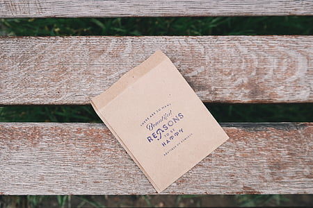 brown paper on wood plank thumbnail