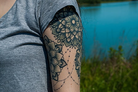 person's mandala tattoo on shoulder thumbnail