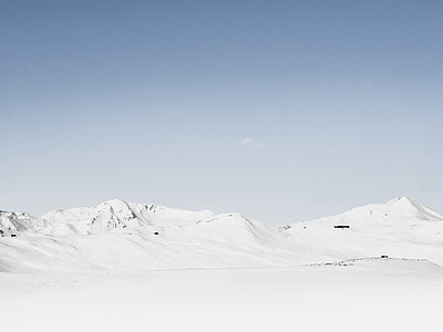 snow covered mountain during daytime thumbnail
