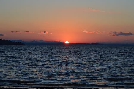 photo of ocean during sunset thumbnail