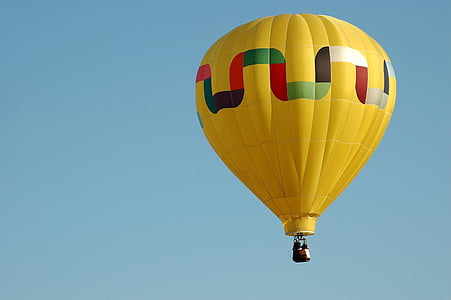 people riding yellow hot air ballon thumbnail