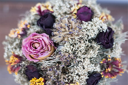 closeup photo of artificial purple flower bouquet thumbnail