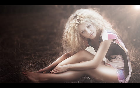 woman sitting on lawn thumbnail