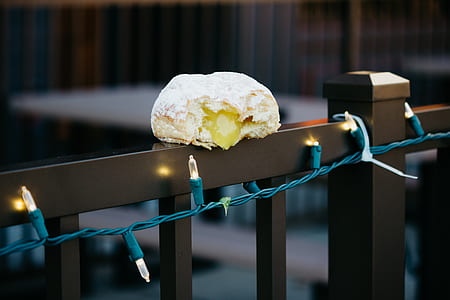 yeast on top of baluster near string lights thumbnail