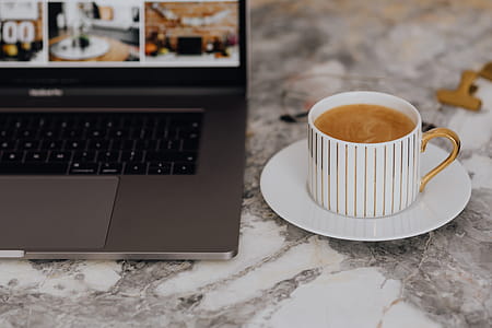 Coffee in a cup on a marble desk thumbnail