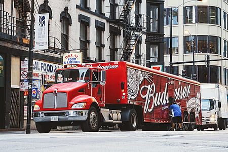 red Budweiser freight truck on the raod thumbnail