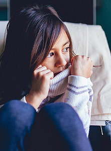 photography of girl in white sweater and blue pants thumbnail