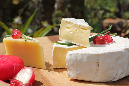 close-up photo of cheese on table thumbnail