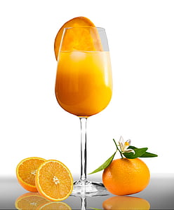 orange fruit beside clear long-stemmed wine glass thumbnail