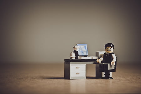 minifig on black wooden chair thumbnail