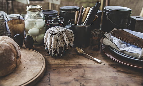assorted kitchen tools on brown wooden panel thumbnail
