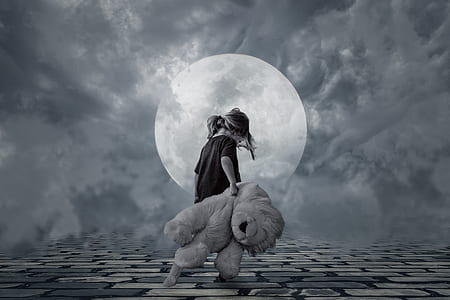 grayscale photo of walking girl carrying lion plush toy thumbnail