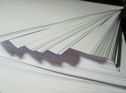 pile of white printer papers thumbnail