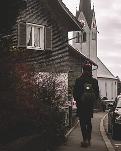 man walk beside road thumbnail