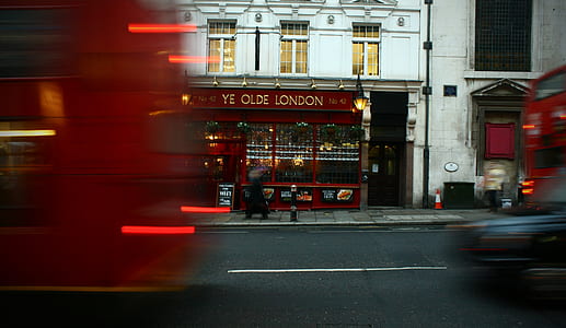white and red Ye Olde London building during daytime thumbnail