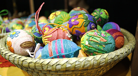 multicolored thread balls in beige tray thumbnail