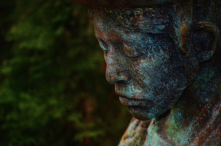 closeup view of human concrete statue thumbnail