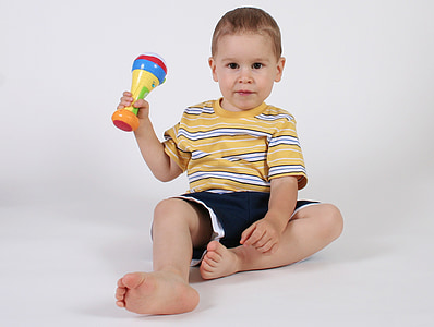 toddler's holding yellow plastic thumbnail