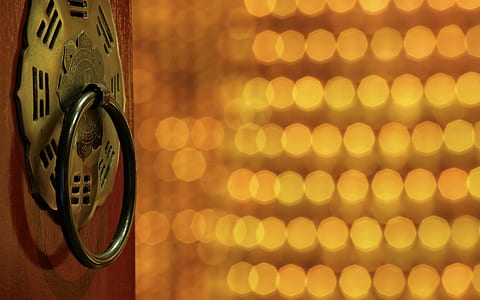 brown door knocker on brown door thumbnail