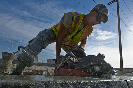 man cutting concrete thumbnail