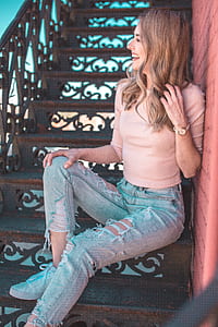woman sitting on staircase thumbnail