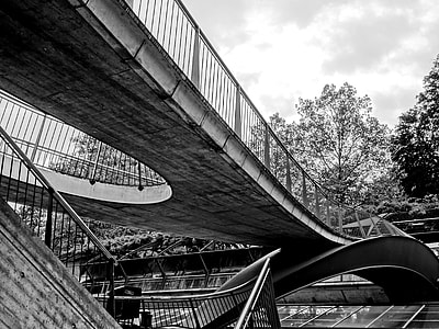 grayscale low angle photo of bridge thumbnail