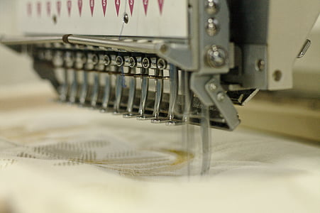 gray and white sewing machine thumbnail