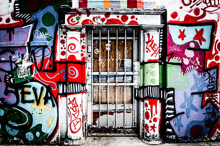 white metal door with paintings thumbnail