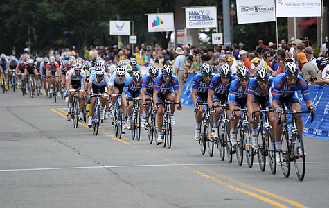 men playing bike race during daytime thumbnail
